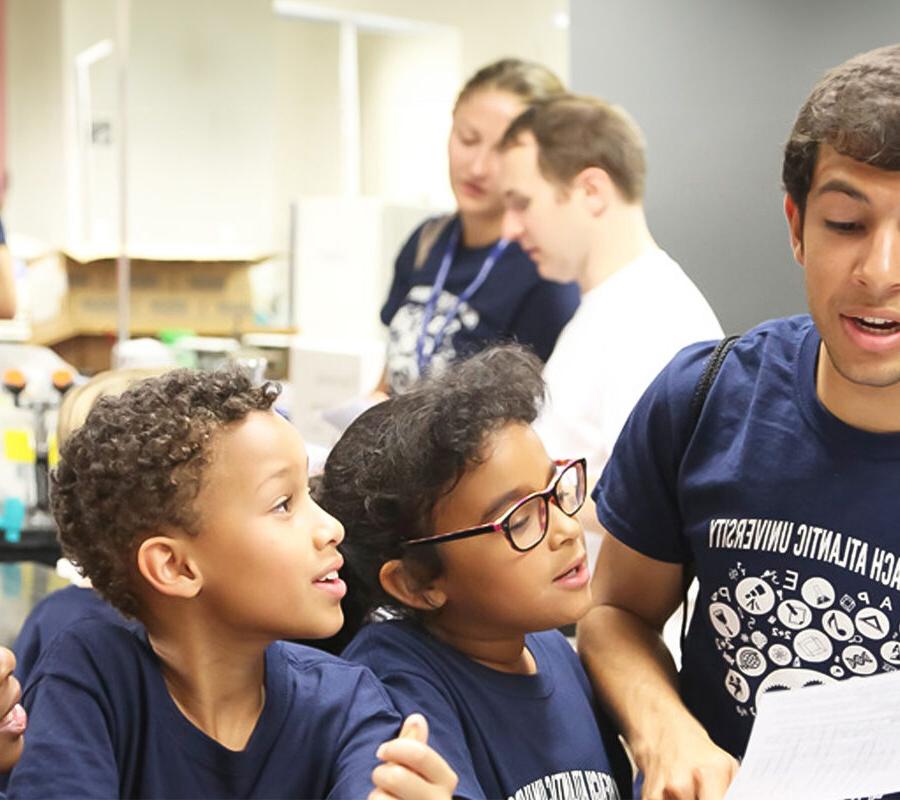 Students participate in an elementary education children's event.